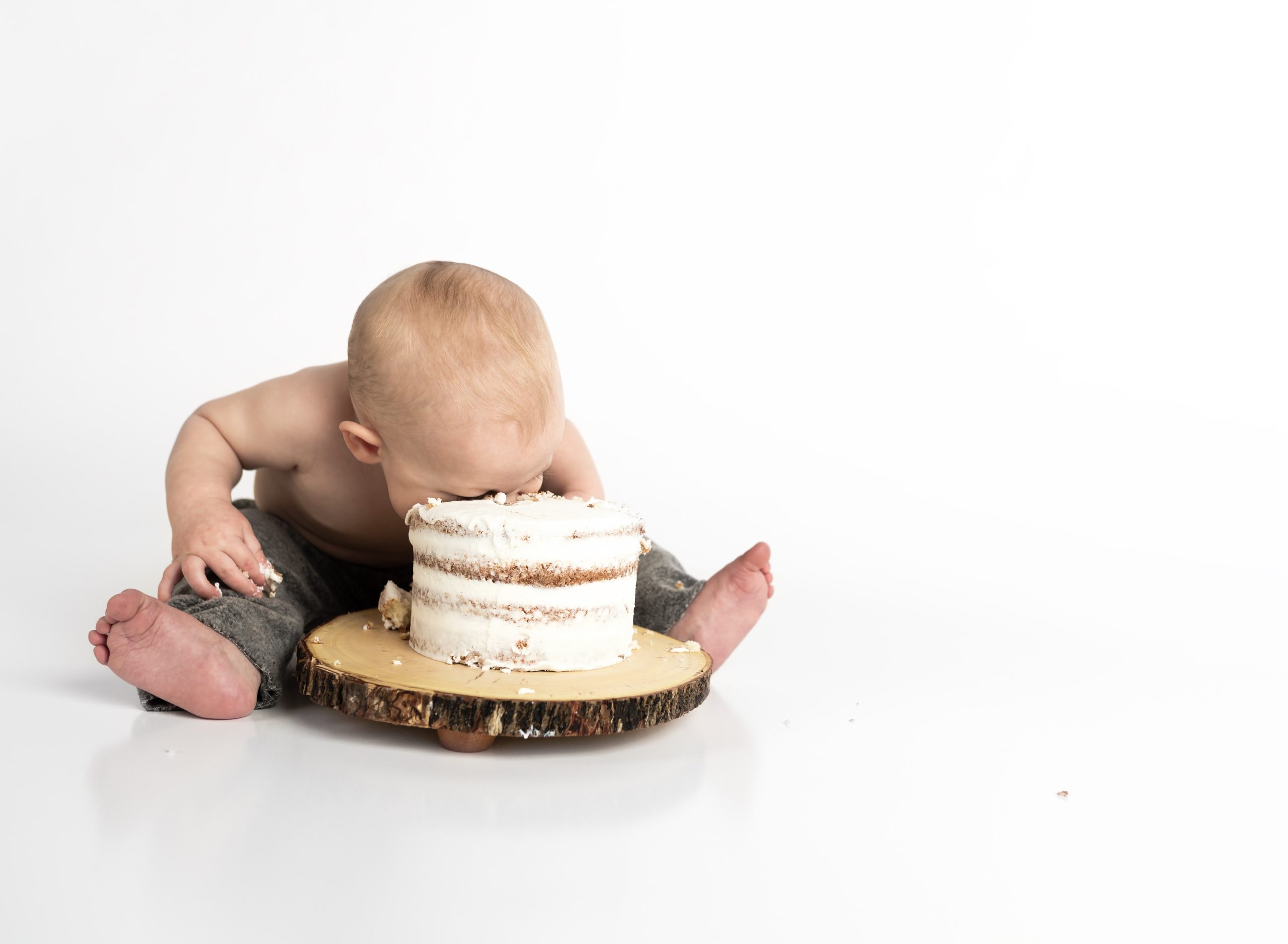 De trend: je kind van kop tot teen in een taart duwen...